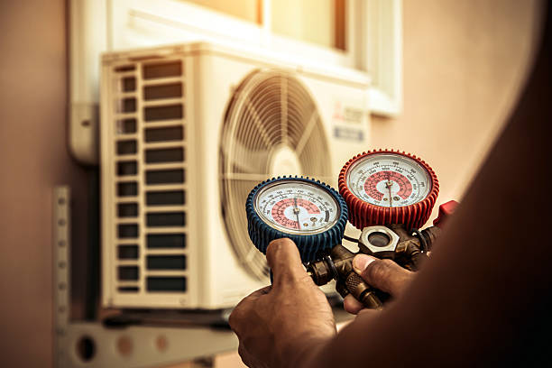 Professional Hvac technician working in Alamo, NV